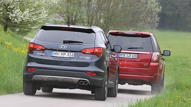 Hyundai Santa Fe 2.2 CR Di 4WD, Land Rover Freelander 2.2 SD4, Heckansicht