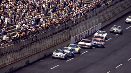 TALLADEGA, AL - MAY 2, 1982: Cale Yarborough (No. 11) keeps in front of an oncoming barrage of cars in the Winston 500 on May 2, 1982 at the Talladega Speedway in Talladega, Alabama. (Photo by ISC Archives/CQ-Roll Call Group via Getty Images) TALLADEGA, AL - MAY 2, 1982: Cale Yarborough (No. 11) keeps in front of an oncoming barrage of cars in the Winston 500 on May 2, 1982 at the Talladega Speedway in Talladega, Alabama. (Photo by ISC Archives/CQ-Roll Call Group via Getty Images)