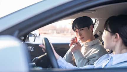 korean ethnicity,indoor smoking,ride together car interior, car steering wheel, rudeness, smoking problem, smoking, indoor smoking