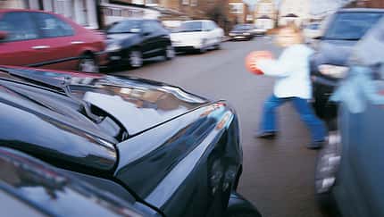 Girl Running Into the Street in Front of a Car