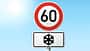 Tempolimit-Schild mit Schneeflocke