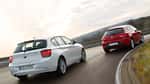 BMW 114i, Seat León 1.4 TSI, Heckansicht