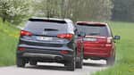 Hyundai Santa Fe 2.2 CR Di 4WD, Land Rover Freelander 2.2 SD4, Heckansicht