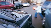 Girl Running Into the Street in Front of a Car