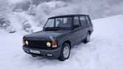 Austin Sprite und Range Rover Vogue